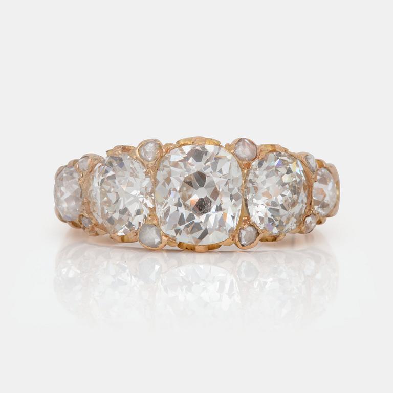 A rose- and old- cut diamond ring. Total carat weight circa 4.00 cts.