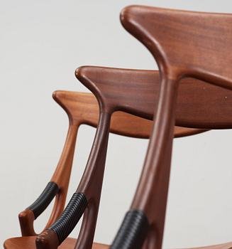 A set of four Arne Hovmand-Olsen teak and mahogany chairs, Mogens Kold, A/S Kerteminde, Denmark 1950's.