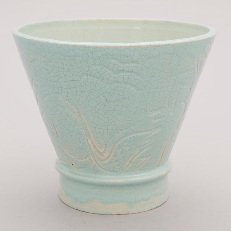 A glazed ceramic pot, signed and dated -34.