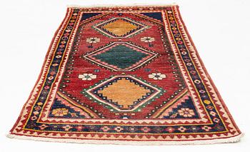 A semi-antique Khersake-Bakthiari carpet, ca 268 x 128-145 cm.
