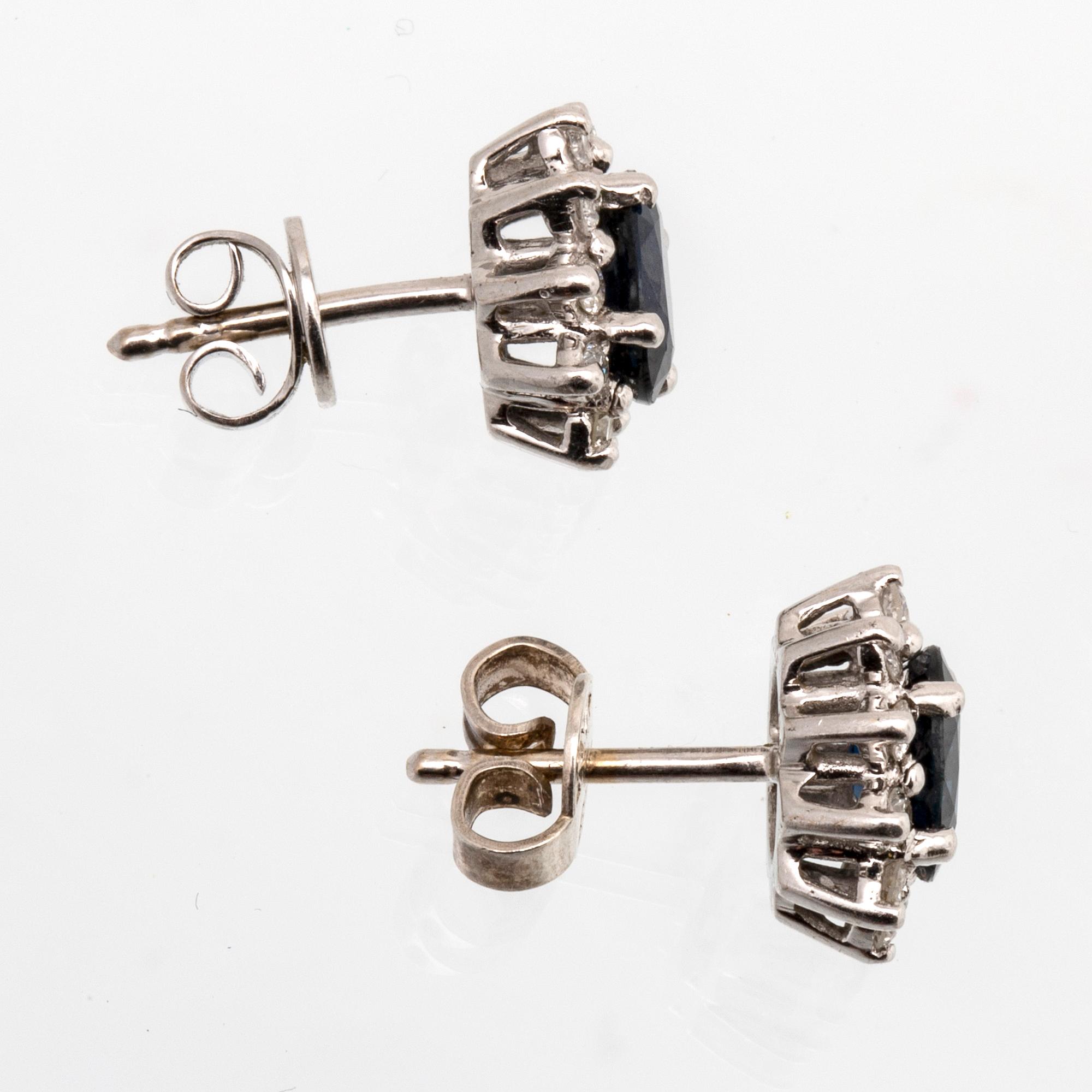 Earrings 18K whitegold 2 sapphires approx 7 x 5 mm and brilliant-cut diamonds approx 0,40 ct in total, Detters Juveler.