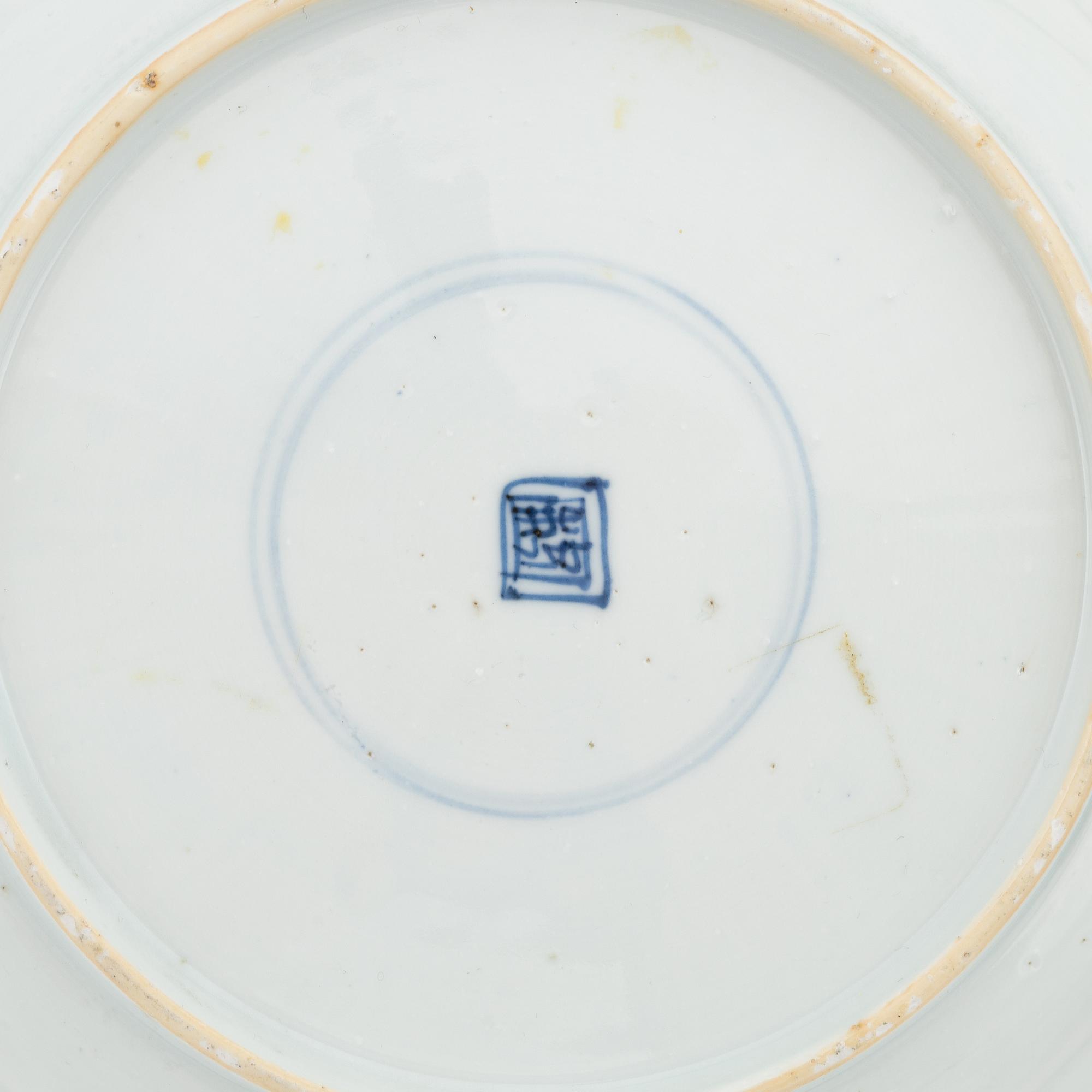 A Chinese dinner plate and a Japanese imari bowl, 18th Century together with a Chinese 19th Century jar with cover.