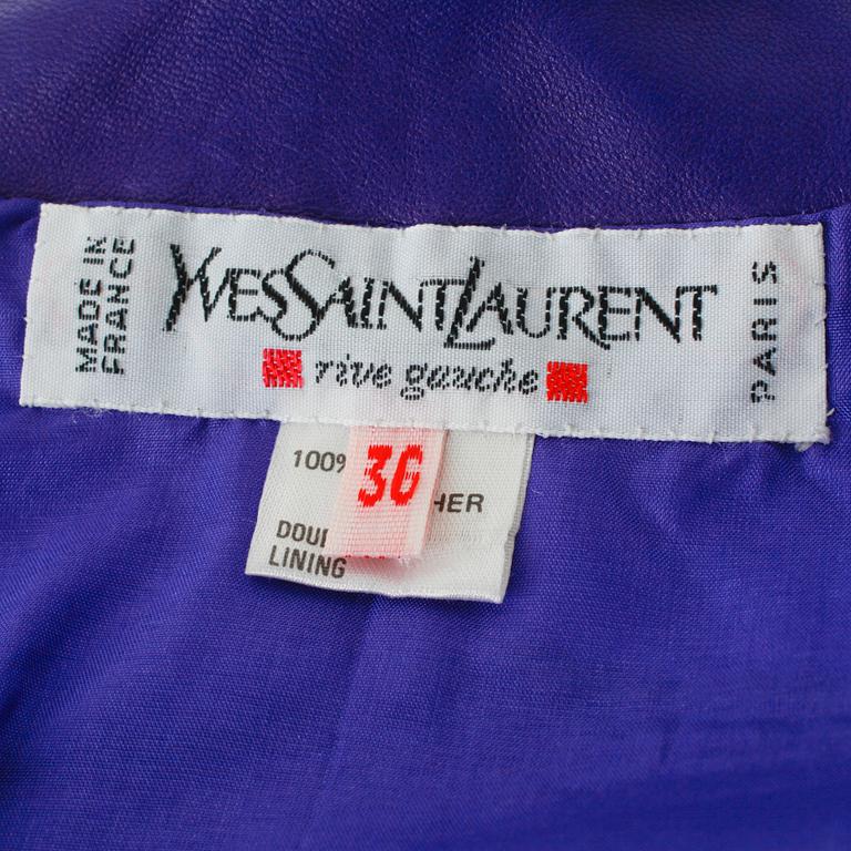 YVES SAINT LAURENT, a purple leather two-piece dress consisting of jacket and skirt.