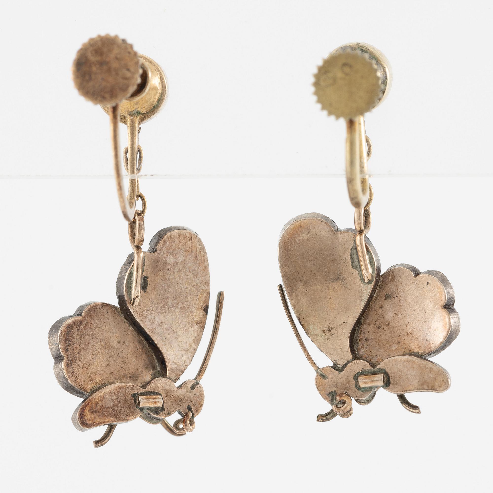 Brooch/pendant and earrings, in the form of butterflies, silver with turquoises and pearls.