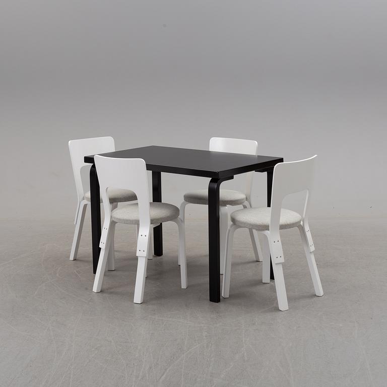 a dining table '81B' and four '66' chairs by Alvar Aalto, Artek.