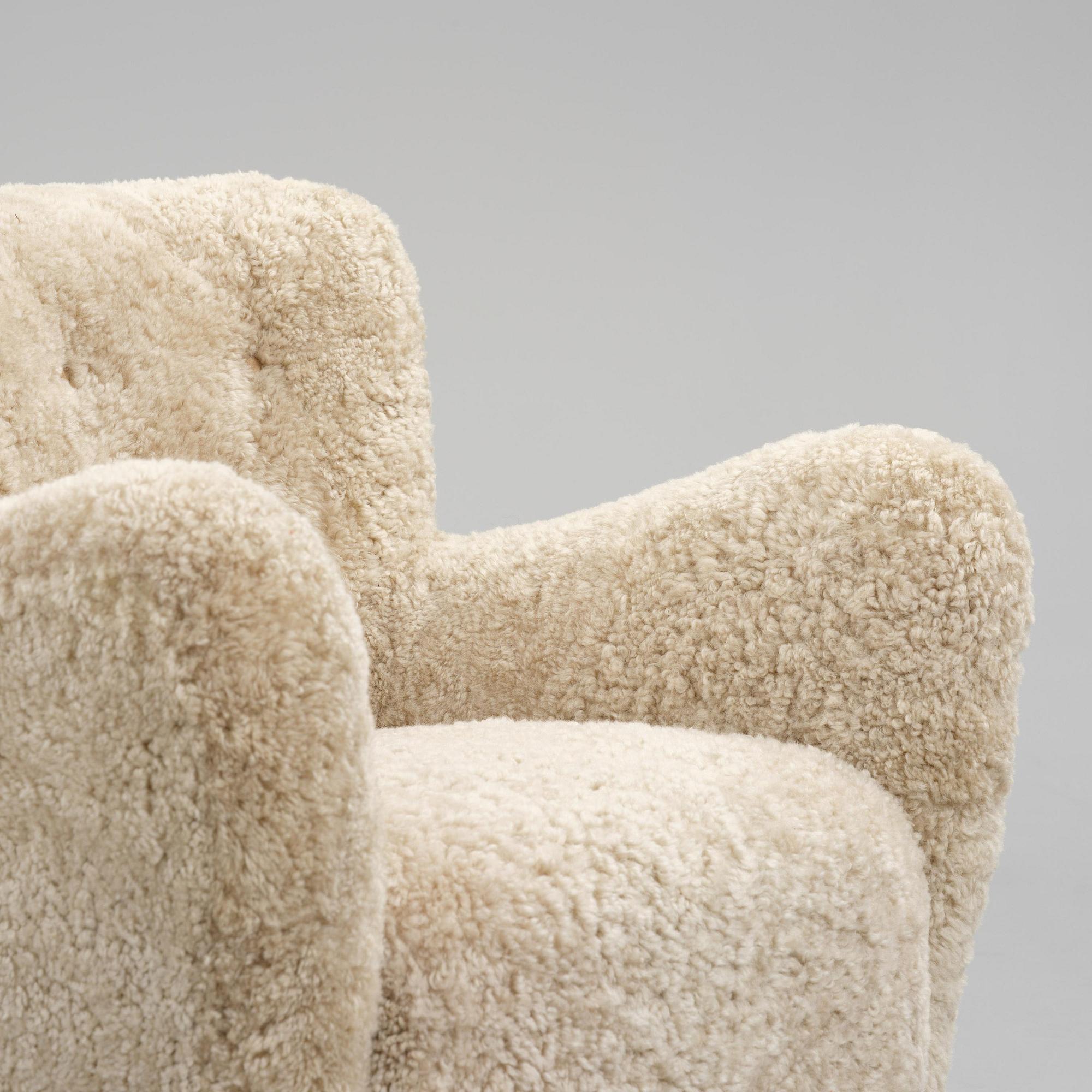 Fritz Hansen, a pair of easy chairs model "1669", Denmark, 1940s.