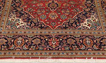 A Keshan rug, approx. 292 x 203 cm.