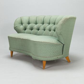A mid-20th-century sofa.
