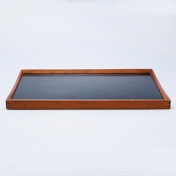 A table tray, model designed by Finn Juhl in 1965.