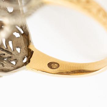 Gold ring with synthetic yellow sapphire.