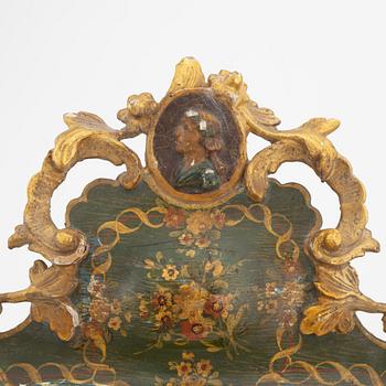 A Rococo style table mirror, probably southern Europe, around the year 1900.