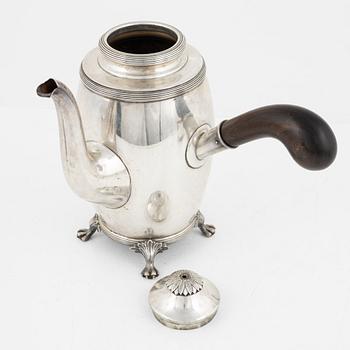 A Swedish Silver Coffee Pot, Creamer and Sugar Bowl, mark of CG Hallberg, Stockholm 1917-18.