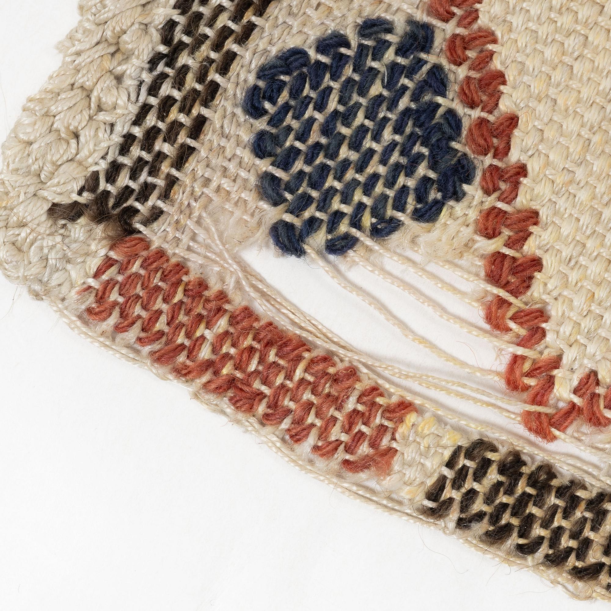 A flat weave textile 'Linneknoppen' by Märta Måås-Fjetterström, c. 77 x 37 cm, signed AB MMF.