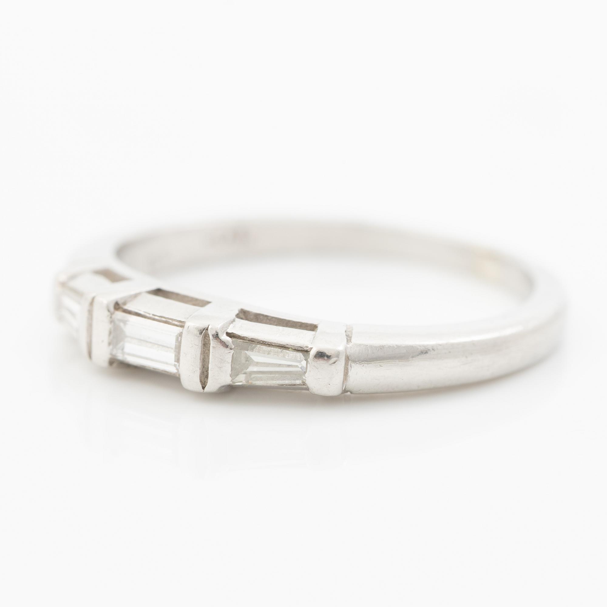 Platinum ring with baguette-cut diamonds.