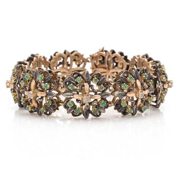 An emerald and rose cut diamond bracelet.