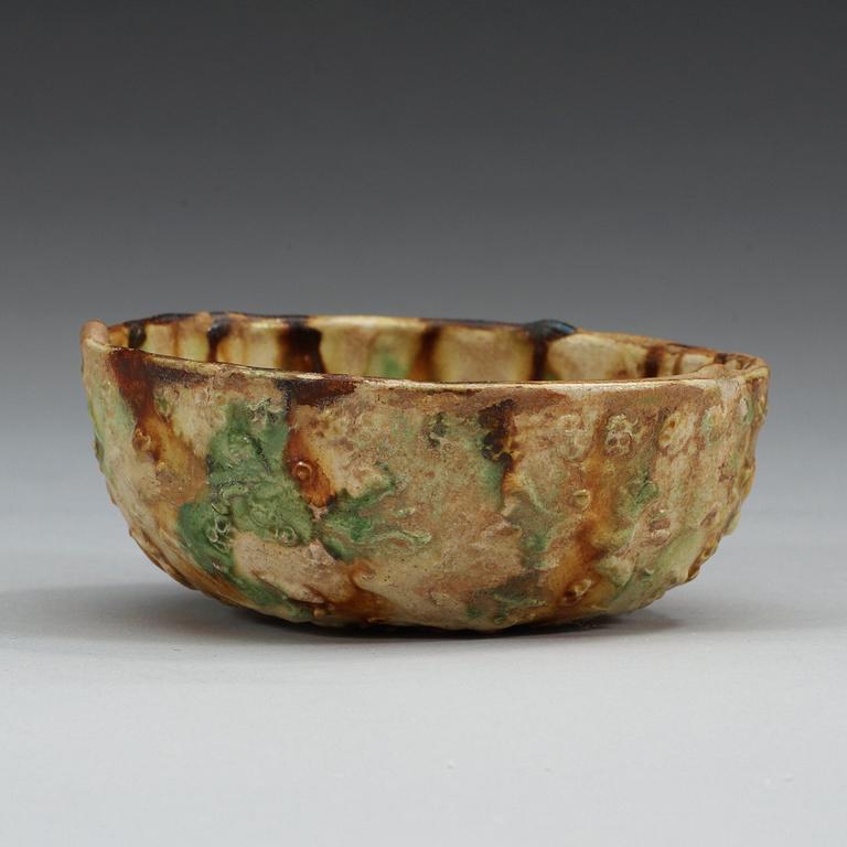 A sancai glazed pottery bowl, Tang dynasty (618-907).
