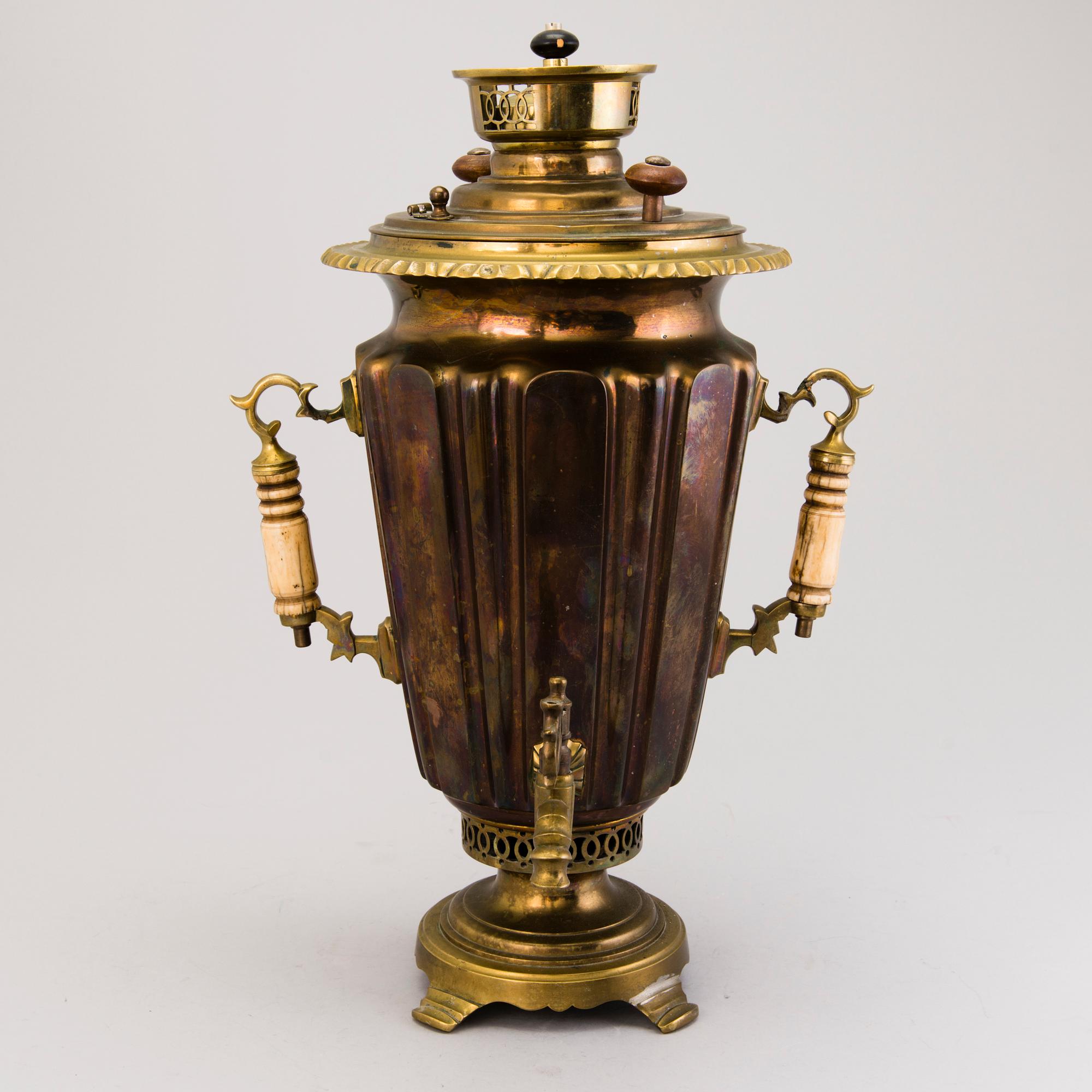 A Russian brass and copper samovar, around 1900.