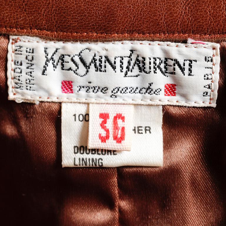 YVES SAINT LAURENT, a brown leather skirt.