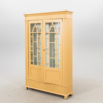 A painted vitrine cabinet, early 20th Century.