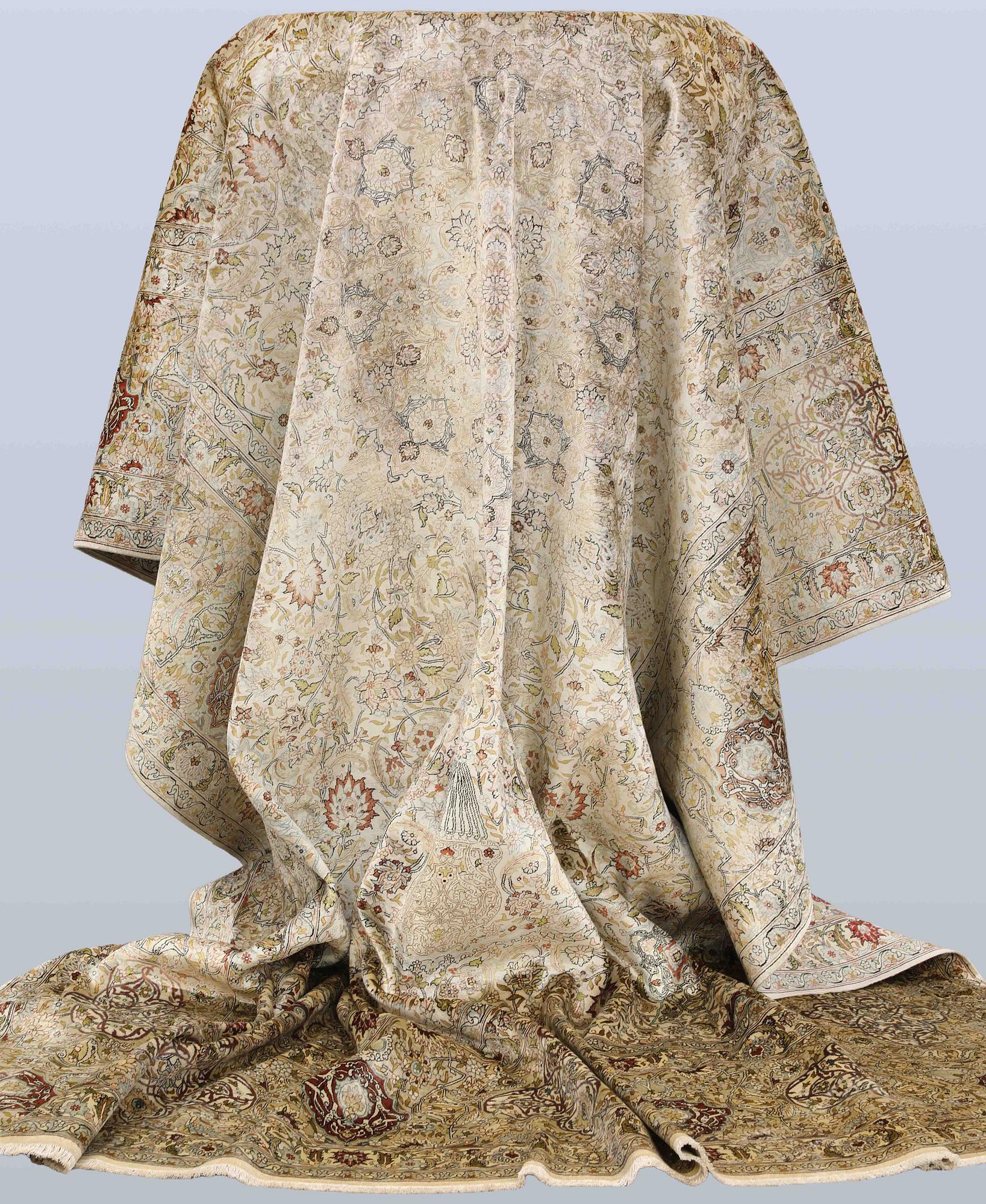 A oriental silk carpet, 350 x 247 cm.