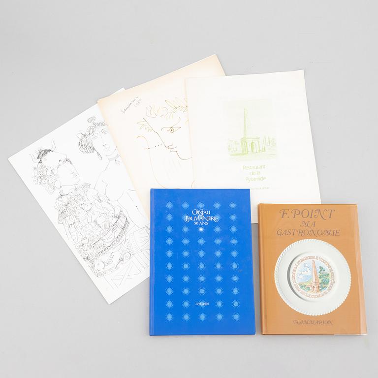 Books and menus of French gastronomy.
