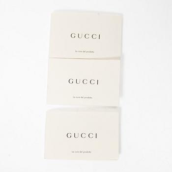 Gucci, a handbag.