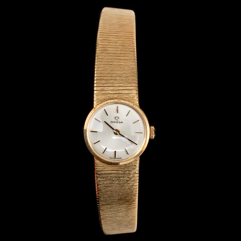 DAMARMBANDSUR, Omega, 18k guld, 1900-talets andra hälft. Vikt 39 g.