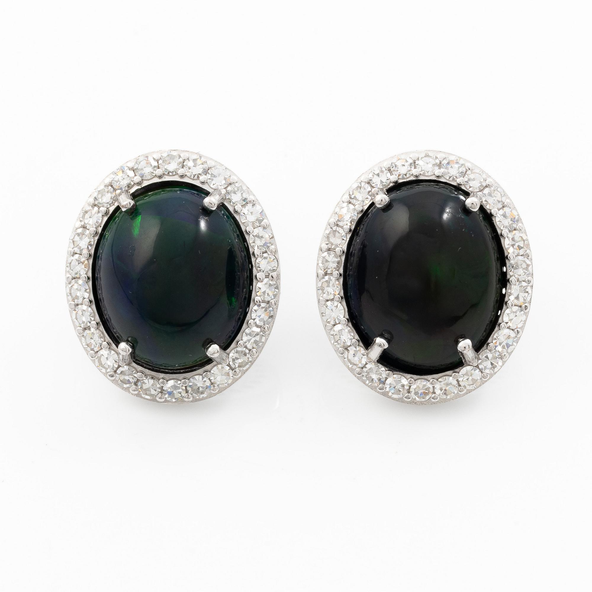 Earrings 18K white gold with opals and octagon-cut diamonds.