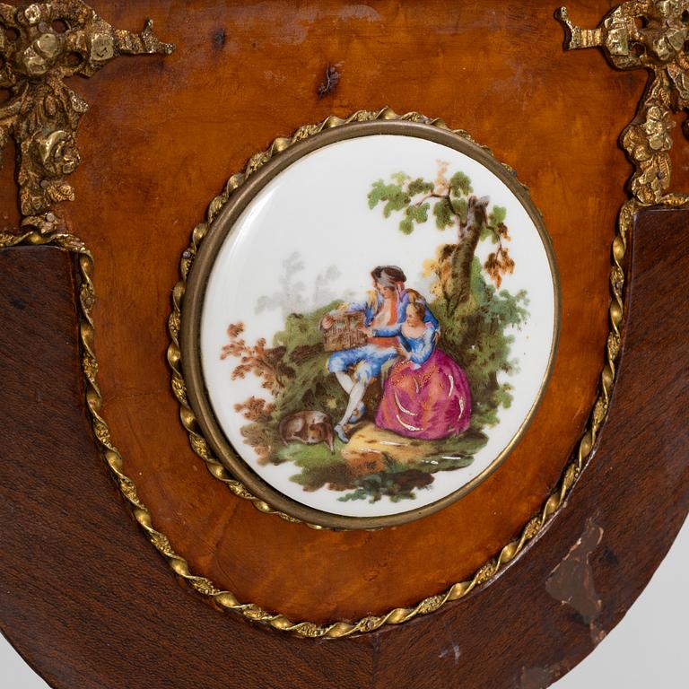 A Louis XVI-style gilt-brass mounted console table, circa 1900.