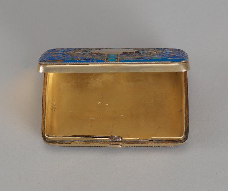 A Russian 19th century silver-gilt and enamel cigarette-case, makers mark of Ivan Chlebnikov, Moscow 1887.