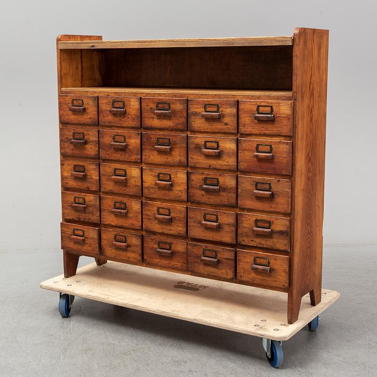 A circa 1900 chest of 20 drawers.