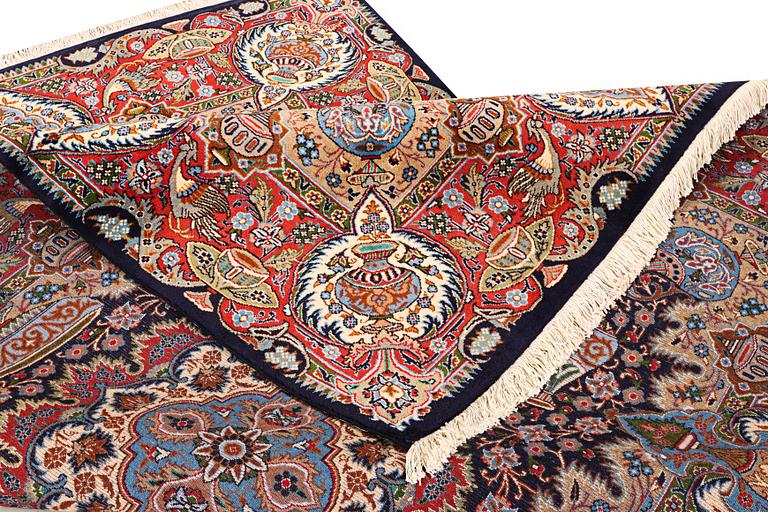 A Kashmar carpet, a. 300 x 200 cm.