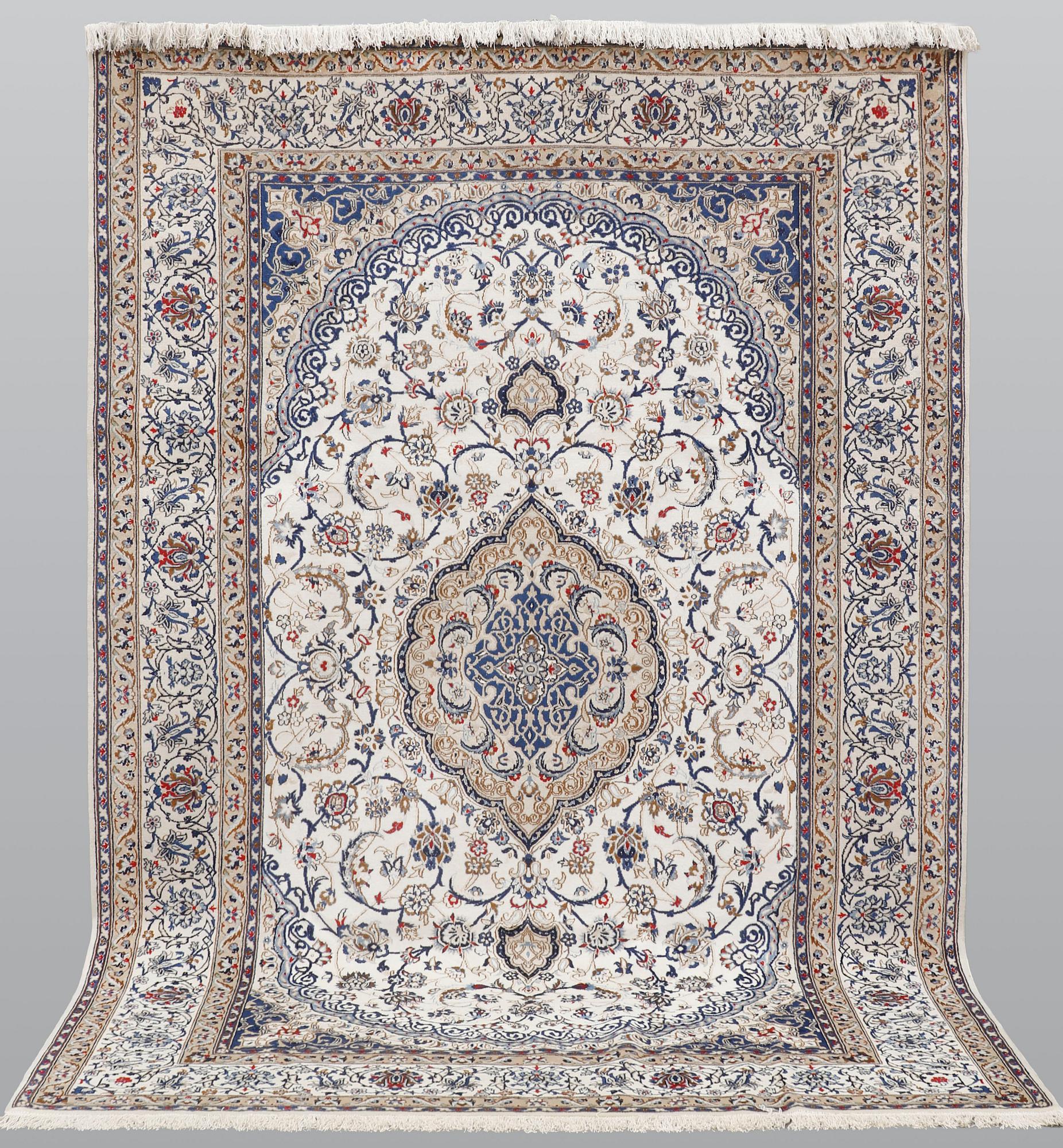 A carpet, Nain Part silk, 312 x 207 cm.