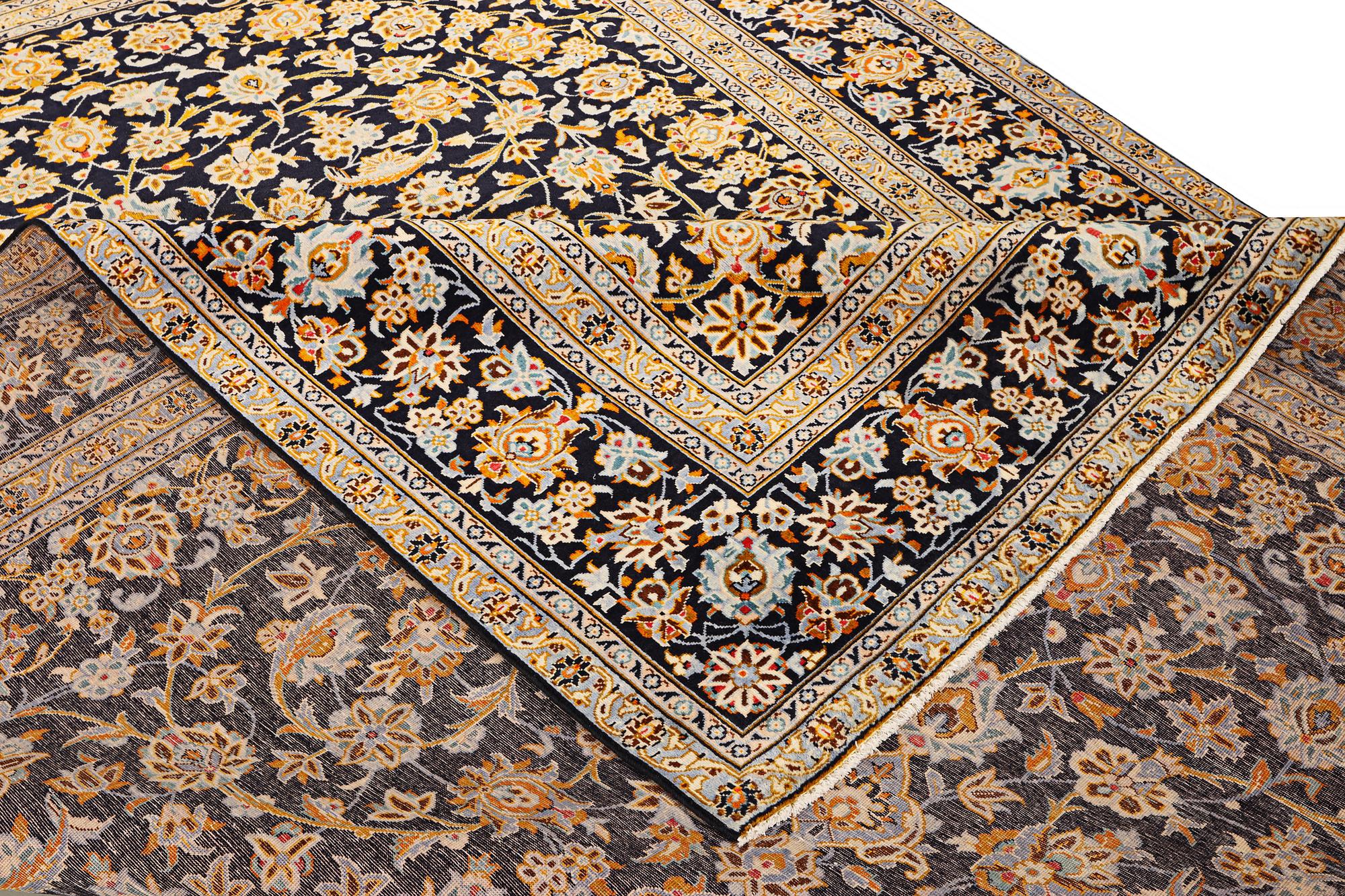 A Kashan carpet, a. 405 x 290 cm.