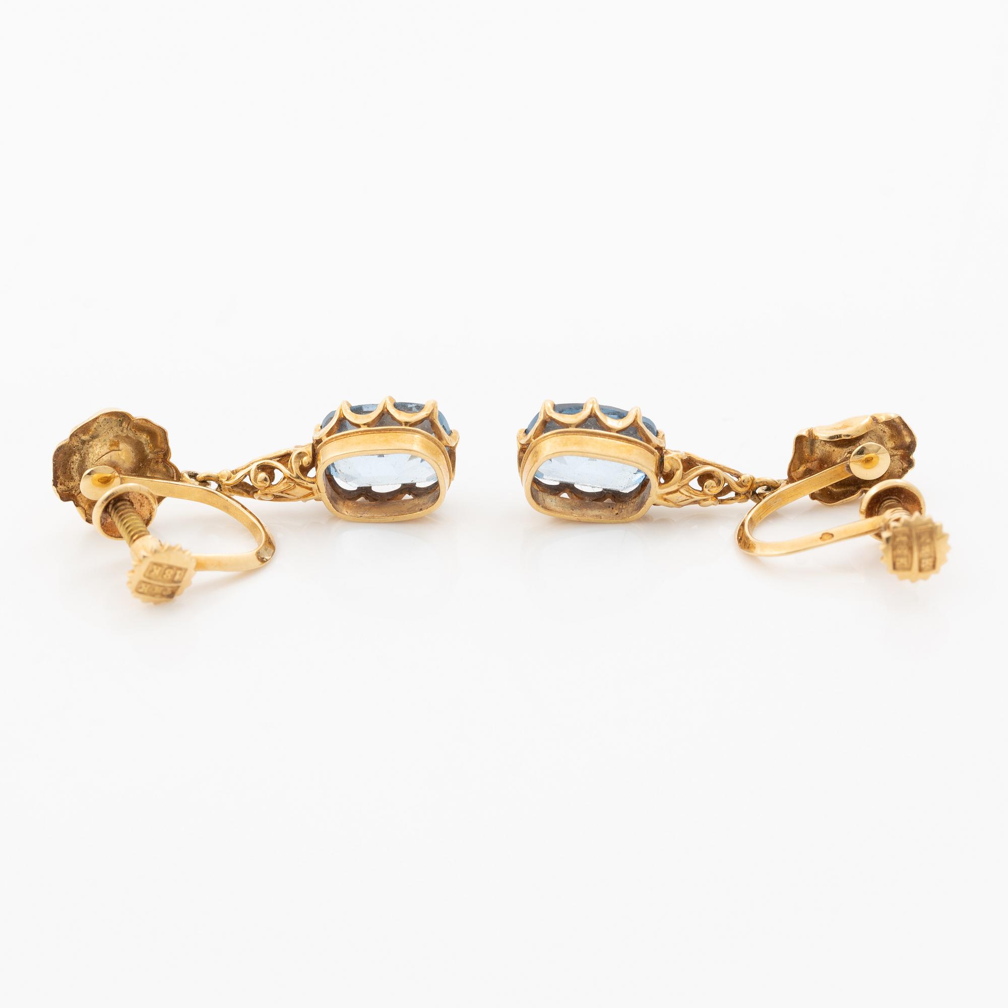 Earrings, 18K gold with synthetic blue spinels.