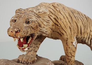 An early 20th cent papier-maché tiger.