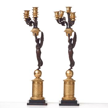 A pair of Empire early 19th century five-light candelabra by Pierre Chibout.