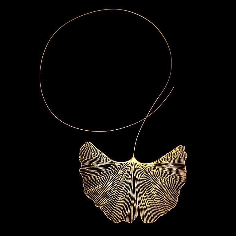 A MARIA JAUHIAINEN NECKLACE, "Ginkgo", stainless steel, 18K gold, 24K gold leaf.