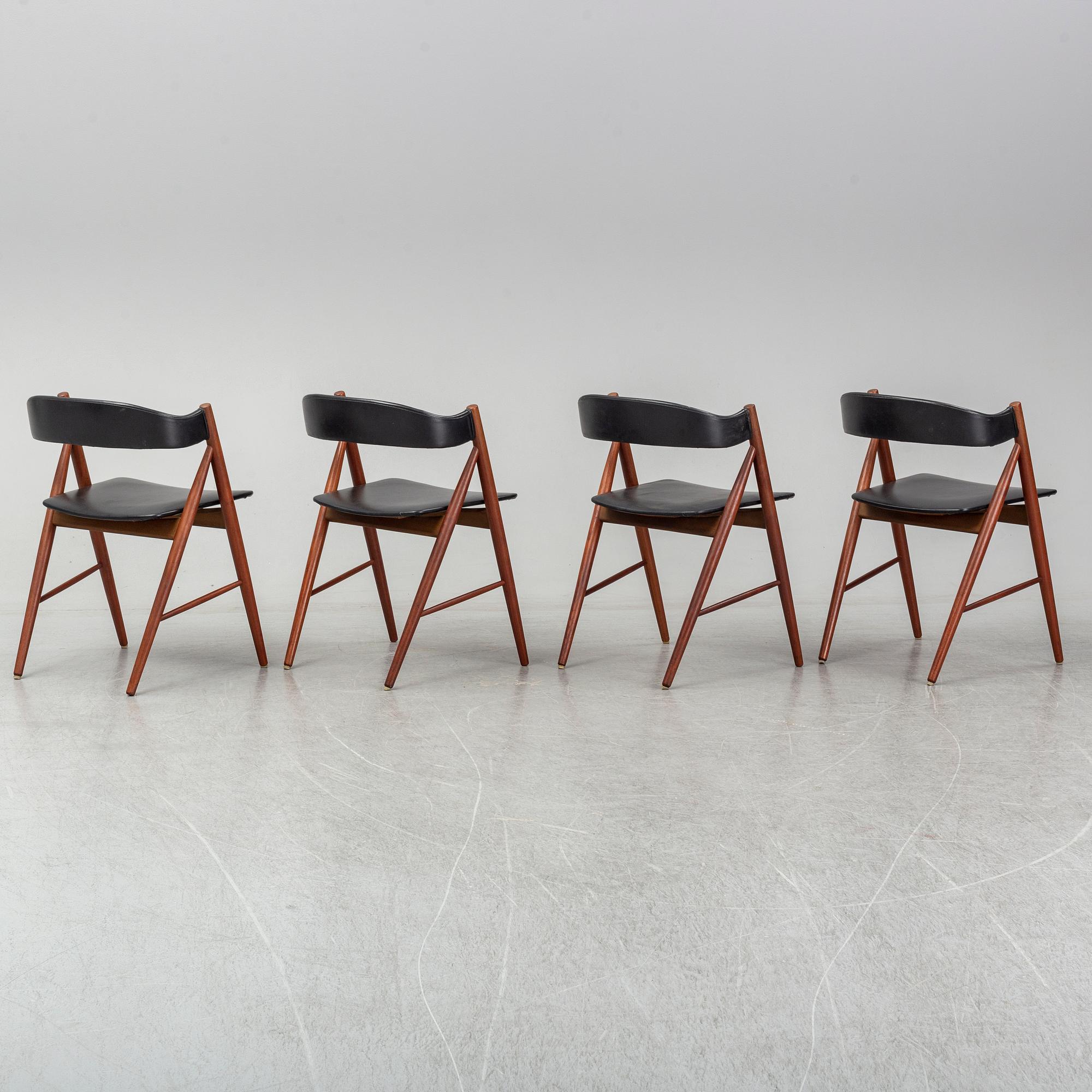 Four 1960s teak chairs.