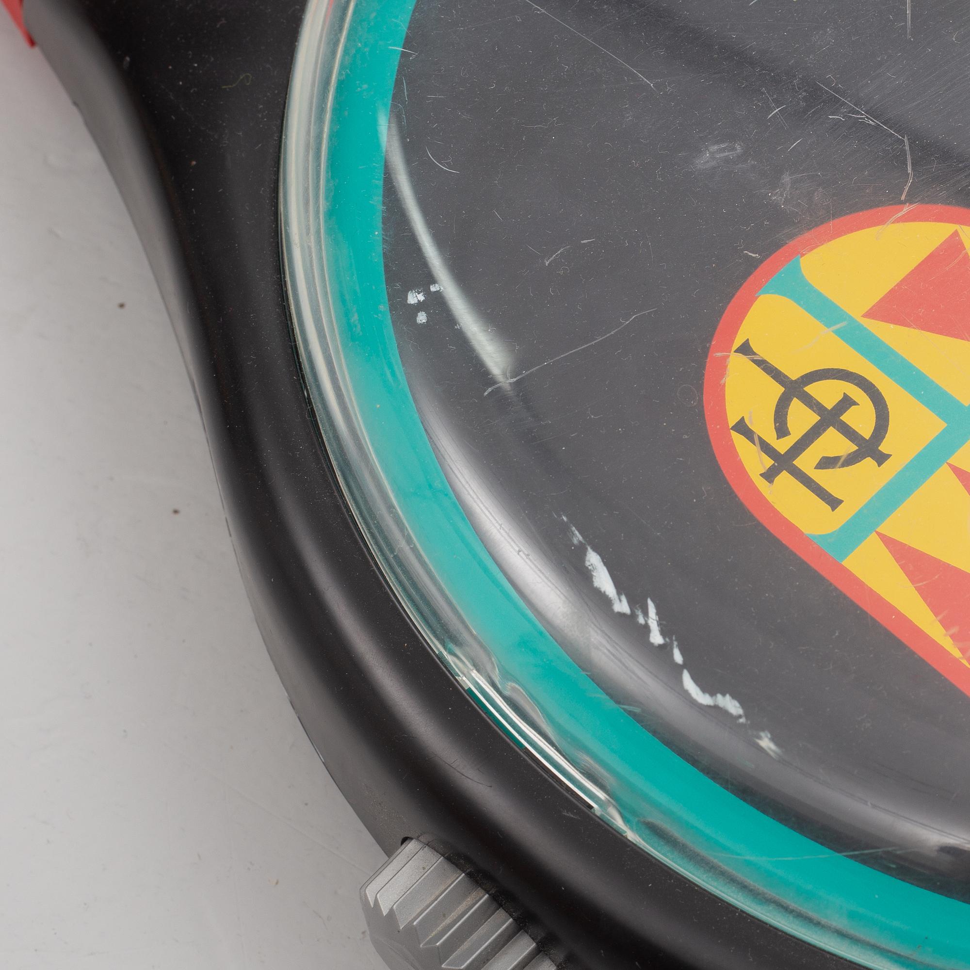 Wall clock, Swatch.