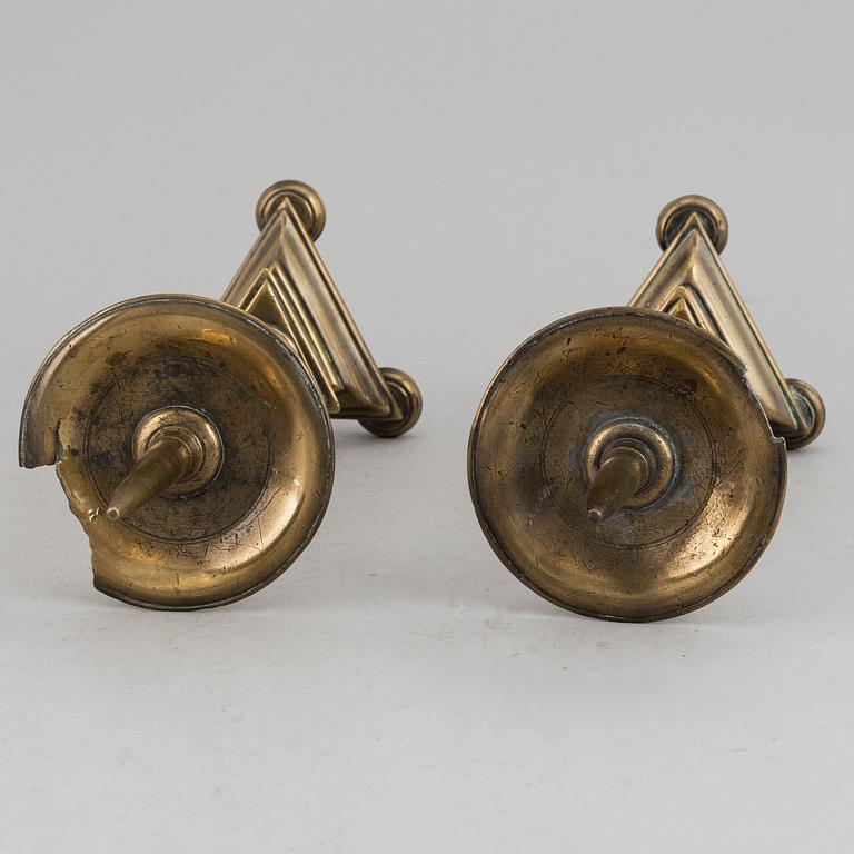 A pair of 17th century bronze candlesticks.