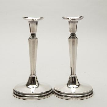 A Swedish 20th century pair of silver candle sticks mark of E Löfman Uppsala 1982.