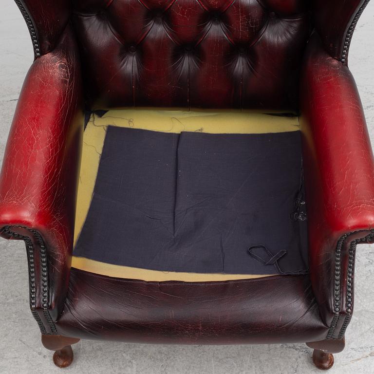 A pair of leather armchairs, end of the 20th century.