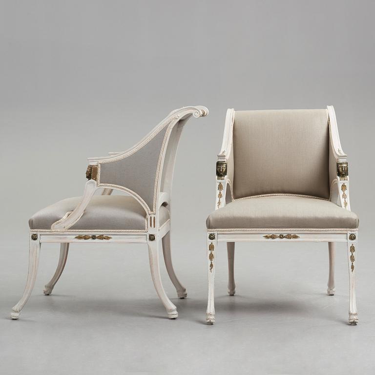 A pair of late Gustavian early 19th century armchairs.