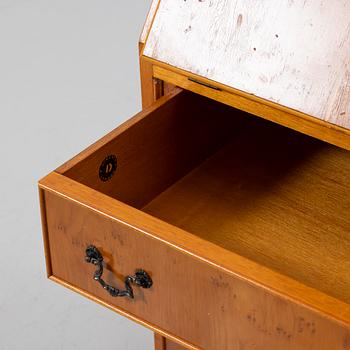 Slant-front secrétaire with glazed cabinet section, 20th century.