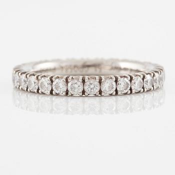 Cartier eternity ring in platinum with round brilliant-cut diamonds.