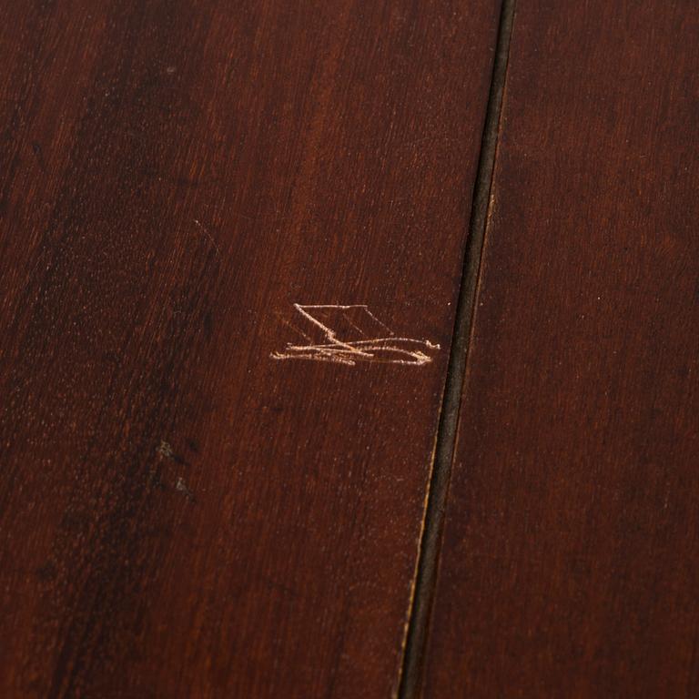 An 18th century English drop-leaf table.