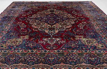 A Kerman carpet, c. 365 x 265 cm.