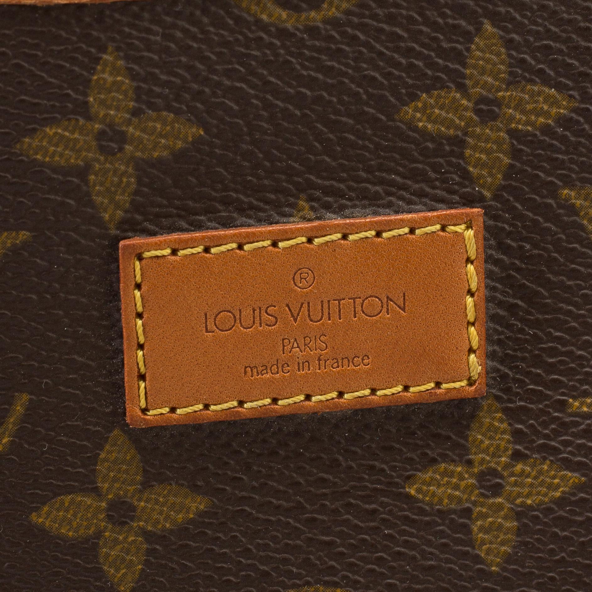 LOUIS VUITTON, a 'Saumur 35' monogram canvas bag.