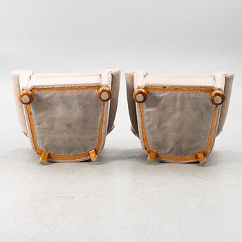 A pair of Swedish modern armchairs, first half of the 20th century.